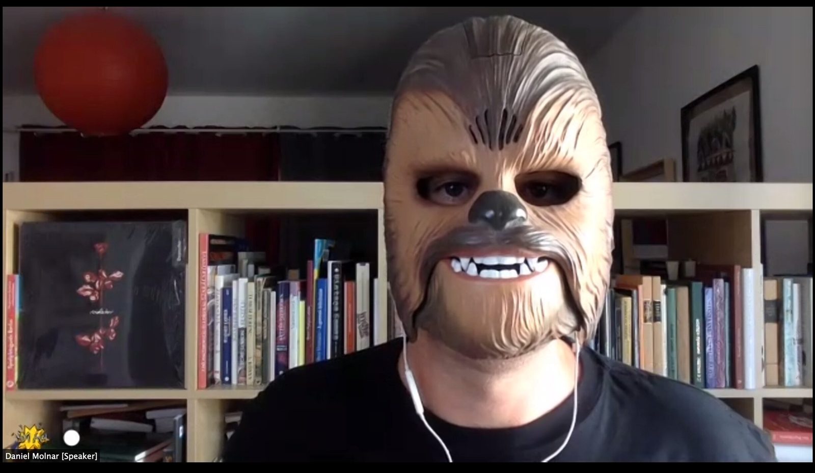 A video call participant wearing a Chewbacca mask